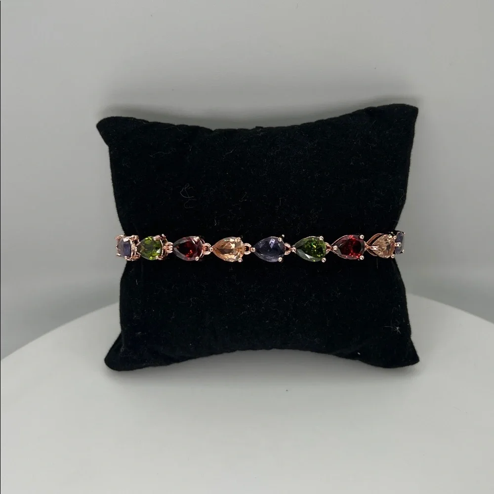 186. Rose Gold Plated Multi Jewel Tone Bracelet 7 1/4”